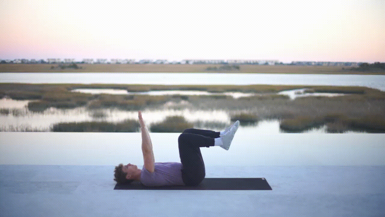 Animated demonstration of the Dumbbell Dead Bugs